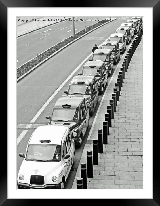 Taxi Rank at Stratford, London Framed Mounted Print by Laurence Tobin