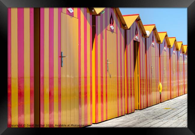Beach huts Framed Print by David Belcher