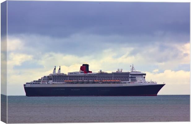 Queen Mary 2 off Teignmouth Canvas Print by Jeremy Hayden
