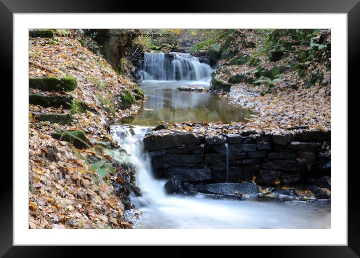 Autumn cascade of water with milky water Framed Mounted Print by Andrew Heaps