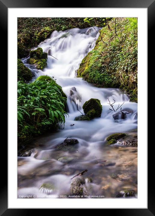 A waterfall surrounded by trees Framed Mounted Print by Simon Wilkinson