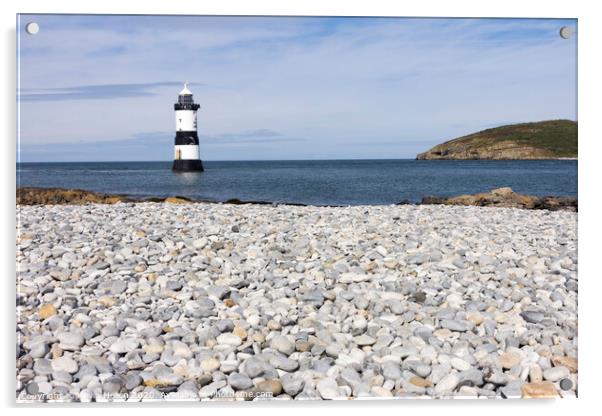 Penmon lighthouse and shingle beach Acrylic by Kevin Hellon