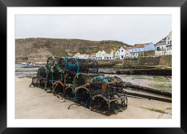 Crab and lobster pots in Staithes Framed Mounted Print by Jason Wells