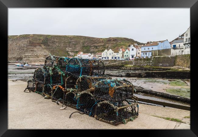 Crab and lobster pots in Staithes Framed Print by Jason Wells