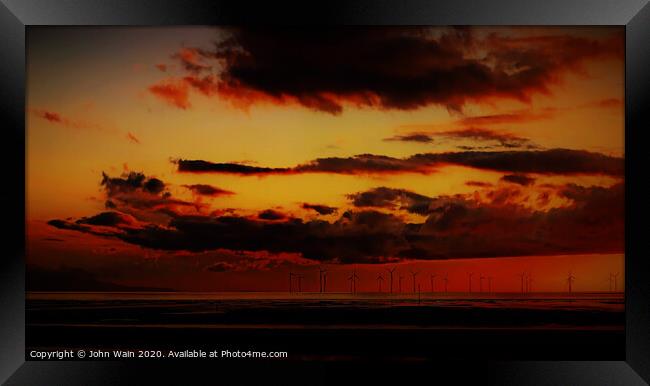 Windmills At Sunset Framed Print by John Wain