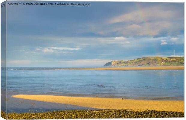 Tranquil Sea in Red Wharf Bay Anglesey Canvas Print by Pearl Bucknall
