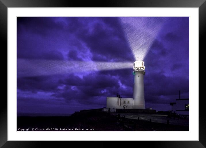 Flamborough Lighthouse, a dark and stormy night. Framed Mounted Print by Chris North