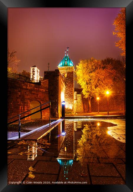 The Porte St Louis, Quebec City, at night reflected in a puddle of water Framed Print by Colin Woods