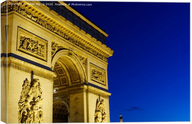 Arc de Triomphe de l'Étoile at night Canvas Print by Navin Mistry
