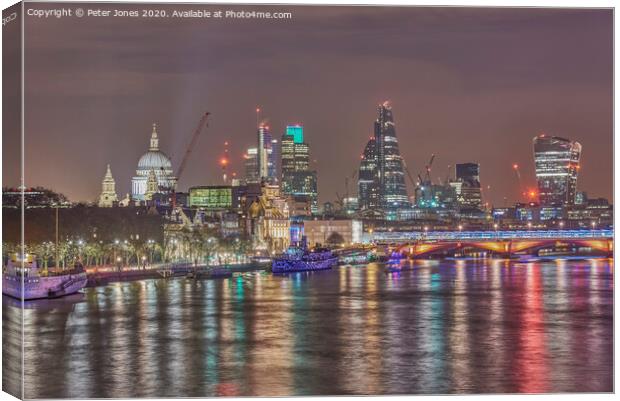London Cityscape at night. Canvas Print by Peter Jones