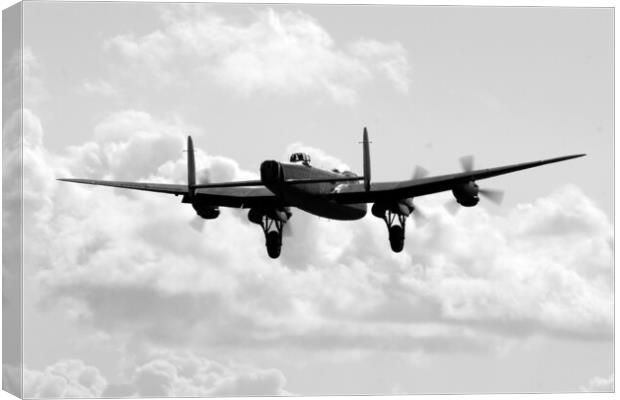 Lancaster Bomber Landing Canvas Print by J Biggadike