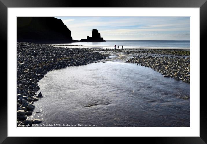 Beach combing at Talisker Bay Framed Mounted Print by Chris Drabble