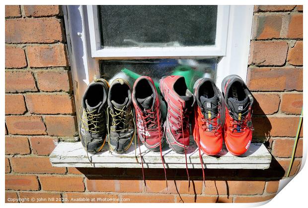 Washed trainers left to dry in the sunshine. Print by john hill