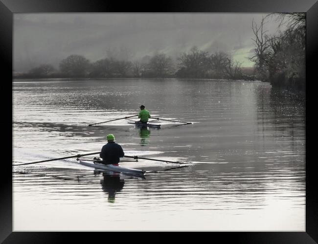 Rowing upstream on the River Dart Framed Print by Elizabeth Chisholm