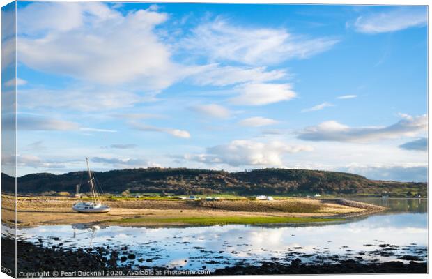 Incoming tide in Red Wharf Bay Anglesey Canvas Print by Pearl Bucknall