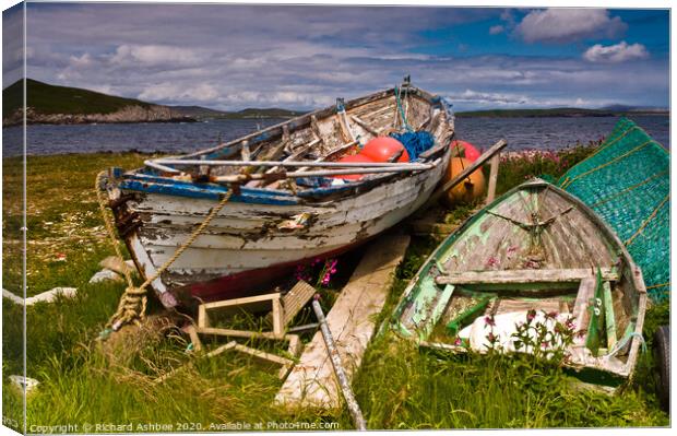 Old decaying fishing boats in Shetland Canvas Print by Richard Ashbee
