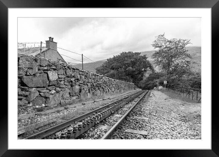 Mount Snowdon Railway, Llanberis, North Wales. The rack and pinion railway track running up Mount Snowdon Framed Mounted Print by Chris Yaxley