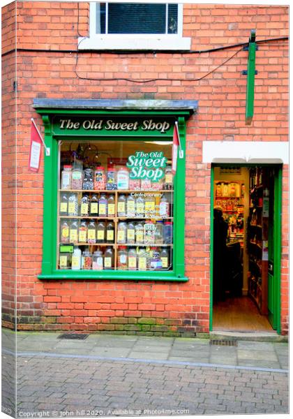 A small the Old Sweet Shop at Southwell in Nottinghamshire. Canvas Print by john hill