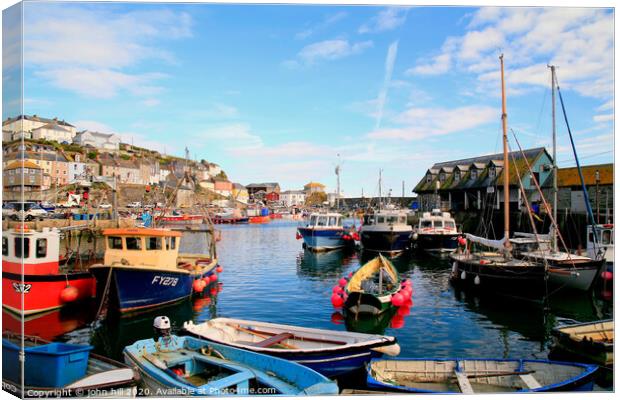 The Cornish harbour at Mevagissey in Cornwall.  Canvas Print by john hill