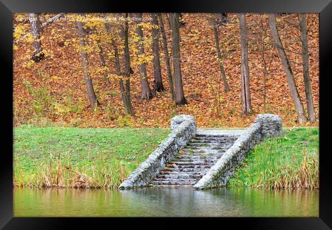 In the autumn pond down the stone old steps. Framed Print by Sergii Petruk