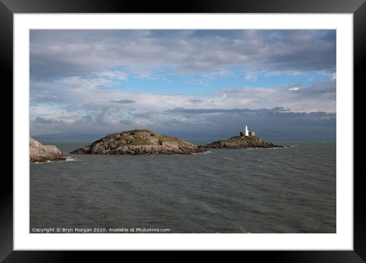 Mumbles lighthouse, Bracelet bay Framed Mounted Print by Bryn Morgan