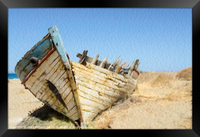wrecked boat ashore in Crete Framed Print by Mary Fletcher