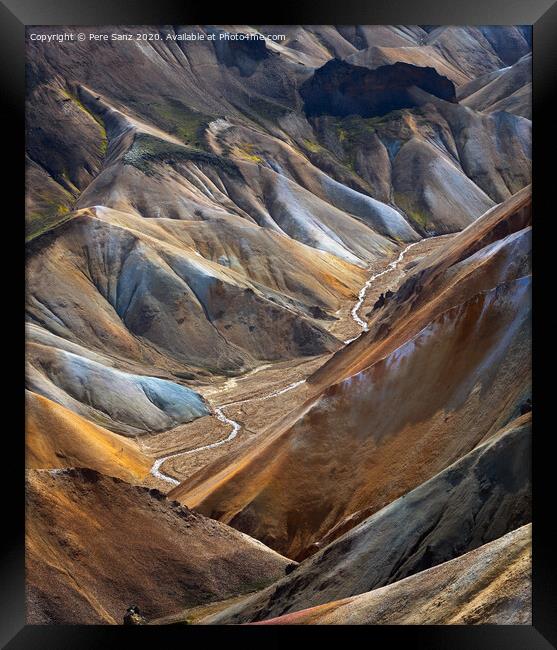 River along a Valley in Landmannalaugar among colorful mountains, Iceland Framed Print by Pere Sanz
