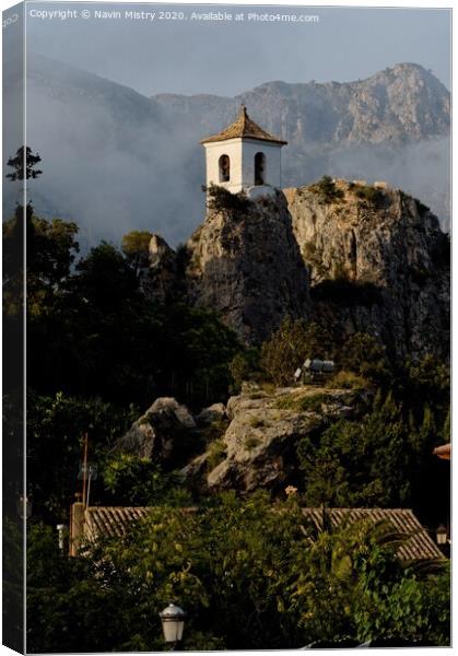 The bell tower of the church of El Castell de Guadalest   Canvas Print by Navin Mistry