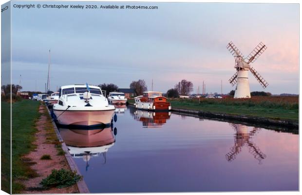Sunrise at Thurne Mill Canvas Print by Christopher Keeley