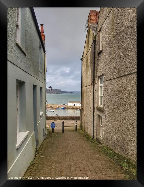 A view of Tenby Harbour from street Framed Print by HELEN PARKER