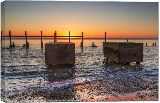 Sunrise over the sea defences Canvas Print by Graeme Taplin Landscape Photography
