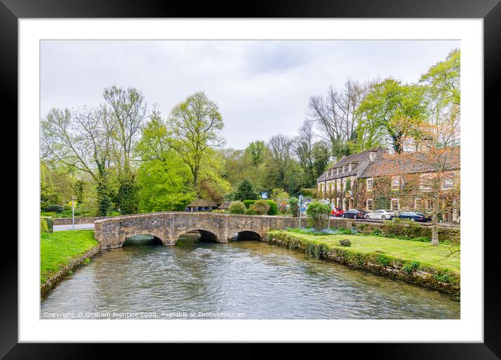 Stone bridge over the River Coln in Bibury Framed Mounted Print by Graham Prentice