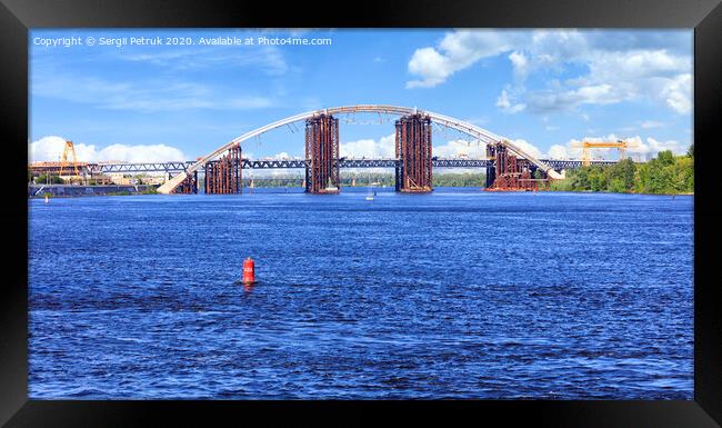 Construction Podolsky bridge on the Dnipro River in Kyiv. Framed Print by Sergii Petruk