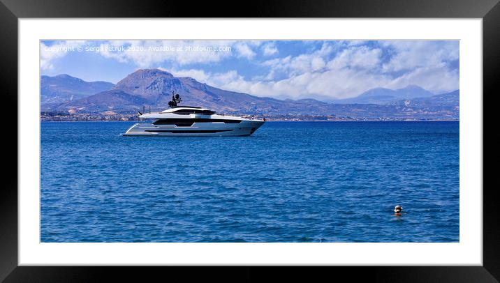 Silhouette of a marine yacht in the Corinthian bay against the backdrop of a mountain range in the morning haze. Framed Mounted Print by Sergii Petruk