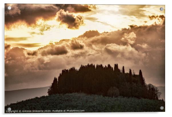 Tuscan landscape with cypress and sunbeams at sunset. Acrylic by Antonio Gravante
