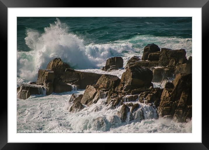 Waves crash against the rocks at Lands End, Cornwa Framed Mounted Print by Michael Shannon