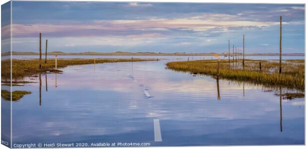 Causeway to Holy Island at Sunset Canvas Print by Heidi Stewart