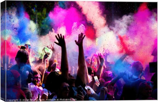 Krakow, Poland - August 25, 2019: Unidentified people playing with colors during hindu festival holi. Hands are visible throwing colors in the air Canvas Print by Arpan Bhatia