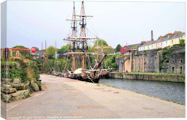 Tall ships moored in Harbour at Charlestown in Cornwall. Canvas Print by john hill