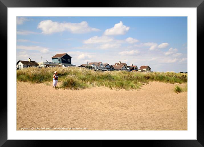 The beach and property at Anderby Creek in Lincolnshire. Framed Mounted Print by john hill