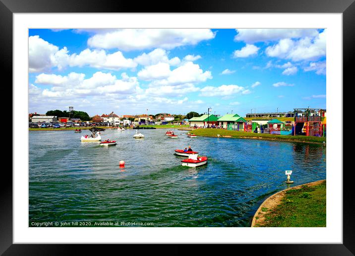 Queens park boating lake at Mablethorpe in Lincolnshire. Framed Mounted Print by john hill