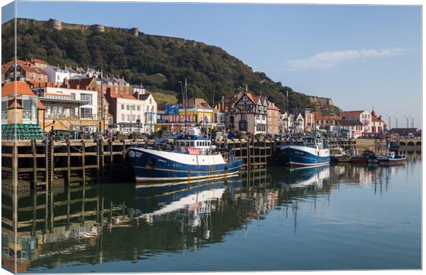 Fishing boats on the Scarborough quayside Canvas Print by Jason Wells