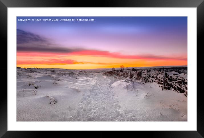 Snow on the moors Framed Mounted Print by Kevin Winter