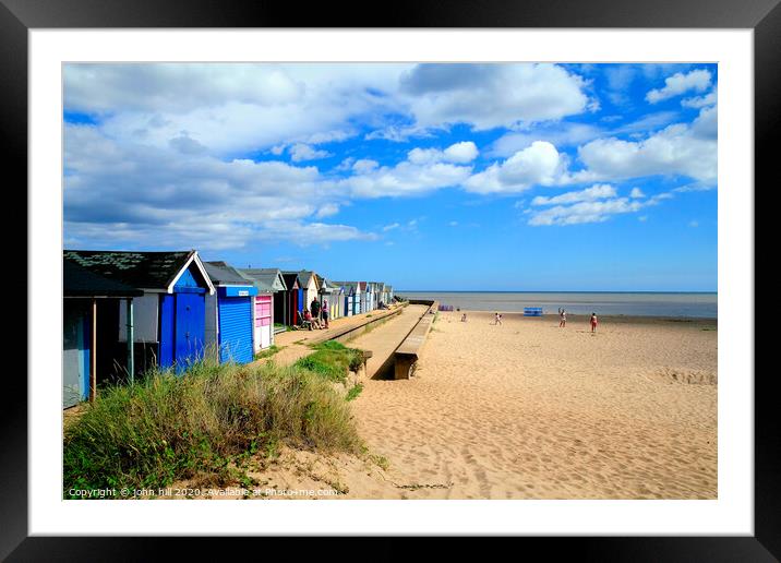 Beach and beach huts at Chapel Point at Chapel St. Leonards in Lincolnshire.  Framed Mounted Print by john hill