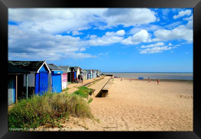 Beach and beach huts at Chapel Point at Chapel St. Leonards in Lincolnshire.  Framed Print by john hill