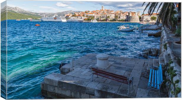 Benches beside the old town of Korcula Canvas Print by Jason Wells