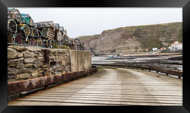 Slipway down to the shoreline at Staithes Framed Print by Jason Wells