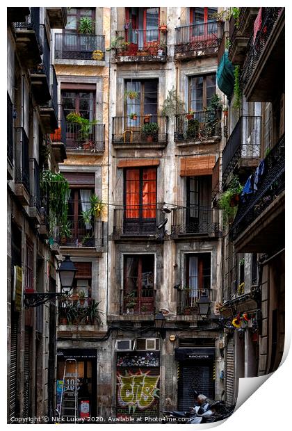 Courtyard in the artist quarter Barcelona Print by Nick Lukey