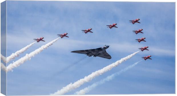 Vulcan and Red Arrows flypast Canvas Print by Jason Wells