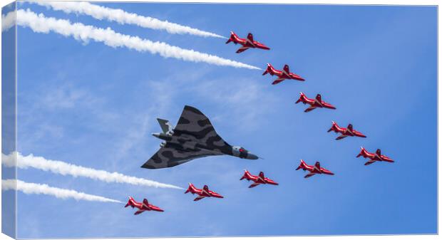 The Vulcan with the Red Arrows one final time Canvas Print by Jason Wells